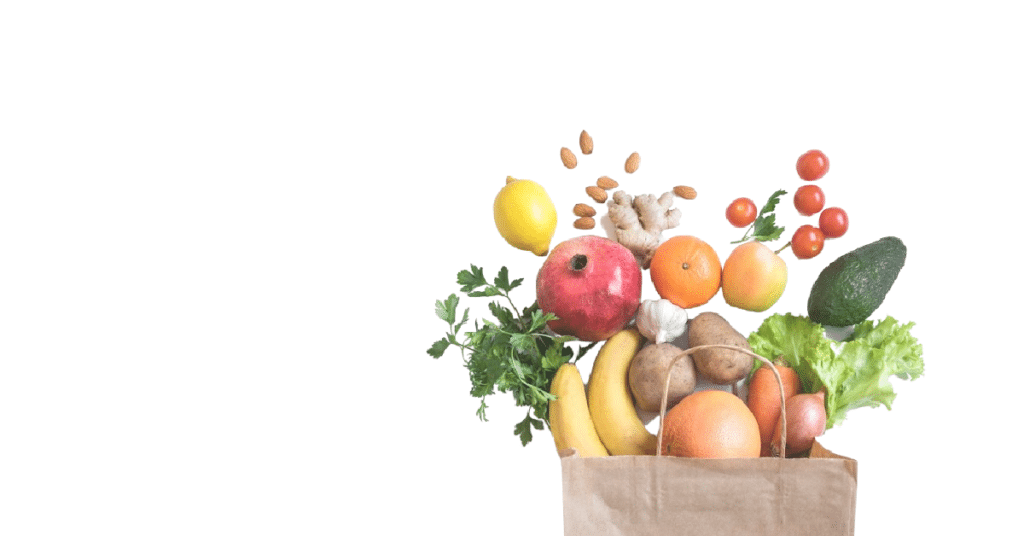 A paper bag full of fruits and vegetables, rich in plant sterols